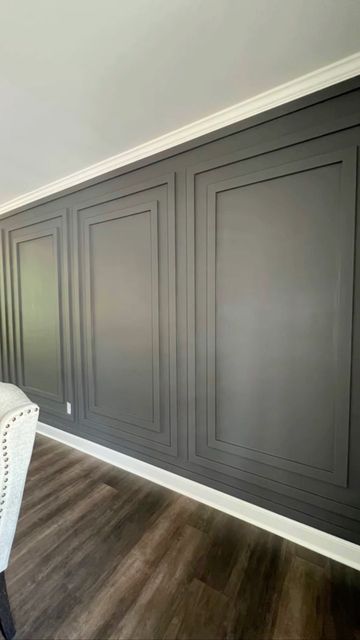 Modern Wall Paneling Dining Room, Wainscoting With Wallpaper Living Room, Small Dining Room Accent Wall Ideas, Paneled Accent Wall Dining Room, Large Accent Wall Dining Room, Square Wall Molding, Media Room Paneling, Panel Accent Wall Dining Room, Black Accent Wall With Pictures