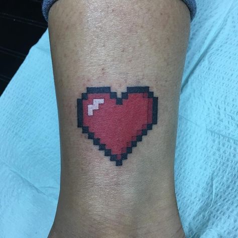 Nicole Dederer on Instagram: “I heart pixel heart ♥️ #tattoo #pixeltattoo #girlswithtattoos #guyswithtattoos #franklintn #franklintattoo #oneup” 8 Bit Heart Tattoo, Minecraft Heart Tattoo, 8 Bit Tattoo, Pixel Heart Tattoo, Heart Ring Tattoo, Pixel Art Heart, 8 Bit Heart, Minecraft Tattoo, Pixel Tattoo