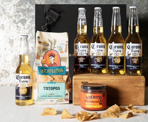 A Father's Day gift hamper featuring Corona beers and delicious treats. The Classic Corona Hamper is perfect for beer lovers who enjoy a laid-back and flavorful celebration. Ideal for a relaxing and enjoyable gift. #FathersDayHampers #ClassicCoronaHamper Gift Hamper Ideas, Fathers Day Hampers, Gourmet Baskets, Hamper Ideas, Beer Pairing, Delicious Treats, Beer Lovers, Gift Hampers, Yummy Treats