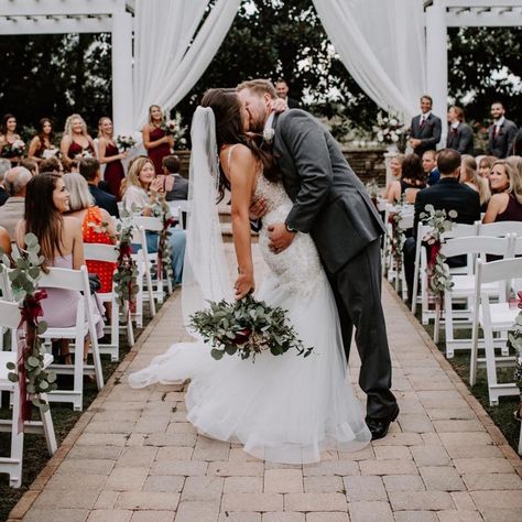 The Royal Crest Room's wedding aisle and the backdrop of the pergola provides the perfect setting for the Recessional Romantic Dip! How perfect is this Wedding Photo! (Photo: Tara Sproc Photography) #royalcrestroom #recessionalkiss #magnoliagarden Dip Down The Aisle, Wedding Photos Dip Kiss, Isle Photos Wedding, Wedding Mid Aisle Kiss, Wedding Ceremony Dip Kiss, Ceremony Dip Kiss, Recessional Wedding Photos, Wedding Dip Pictures, Kiss Halfway Down Aisle