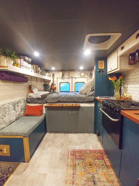 Woman Living in Her Off-Grid Ambulance Camper Conversion Ambulance Conversion Ideas, Ambulance To Rv Conversion, Tiny Camper Interior Layout, Living Off Grid In A Camper, Converted Ambulance Camper Van, Box Van Conversion Campers, Renovated Ambulance, Tiny Camper Living, Ambulance Conversion Campers