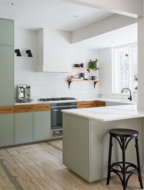 A clean and fresh-looking kitchen remodel with sage kitchen cabinets, Calacatta marble counters, and handmade subway tiles by interior designers Arent & Pyke of Sydney | Remodelista Sage Kitchen, Sydney House, Popular Kitchen Designs, Sage Green Kitchen, Modern Kitchen Remodel, Green Kitchen Cabinets, Australian Interior Design, Interior Design Awards, Popular Kitchens