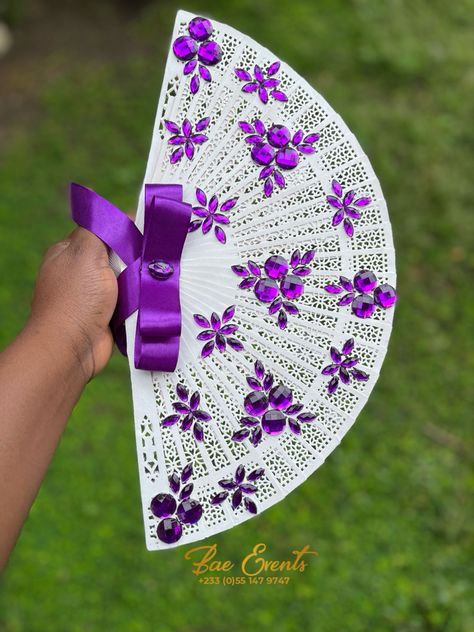 Wooden fan White and violet bridal fan Bridal Fan Bouquet, Bridal Fans Ghana, Bridesmaids Fans, Bridal Hand Fan, Diy Wedding Fans, Safety Pins Fashion, Bridal Fans, Bridal Fan, African Bridesmaids