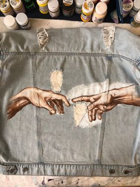 Michelangelo Creation Of Adam, Painted Clothes Diy, Custom Denim Jacket, Hand Painted Denim Jacket, Diy Jeans, Denim Art, Painted Denim Jacket, Painted Jacket, Diy Jacket