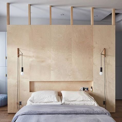 In the Brooklyn bedroom of design-savvy couple Keith Burns and Lauren Snyder (he's an architect and she owns the NY-based shop @theprimaryessentials), a birch ply divider creates both a headboard and a closet wall, and is left open at the top to allow light to pass through. See more of their recently gut-renovated Bed-Stuy brownstone today on Remodelista. | 📸 by @hawkclaw    #Regram via @remodelista Brooklyn Brownstone, Home Goods Store, Provence Style, Wall Closet, House Inside, Modern Bedroom, Home Buying, Old Houses, Home Remodeling