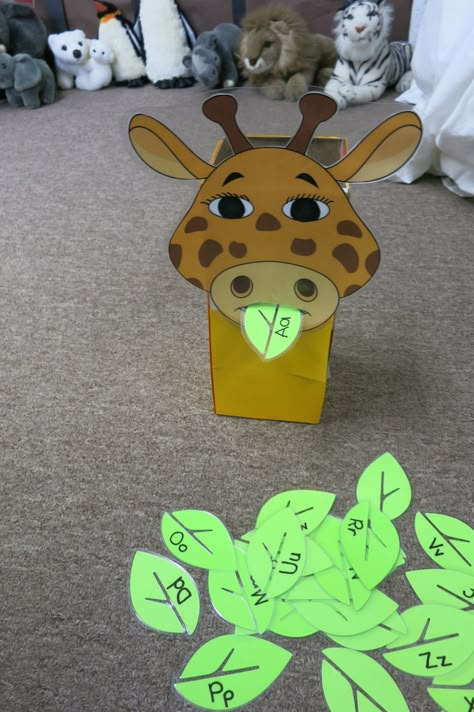 Feeding Gerald the Giraffe:  Students have to give the sound the letter makes to feed him a leaf.  This game helps with phonological awareness. Jungle Safari Activities For Preschool, Giraffe Eyfs Activities, Giraffe Preschool Activities, Giraffe Activities For Toddlers, Safari Gross Motor Activities, Giraffe Activities Preschool, Safari Activities For Kindergarten, Safari Activities For Preschool, Safari Kindergarten Activities