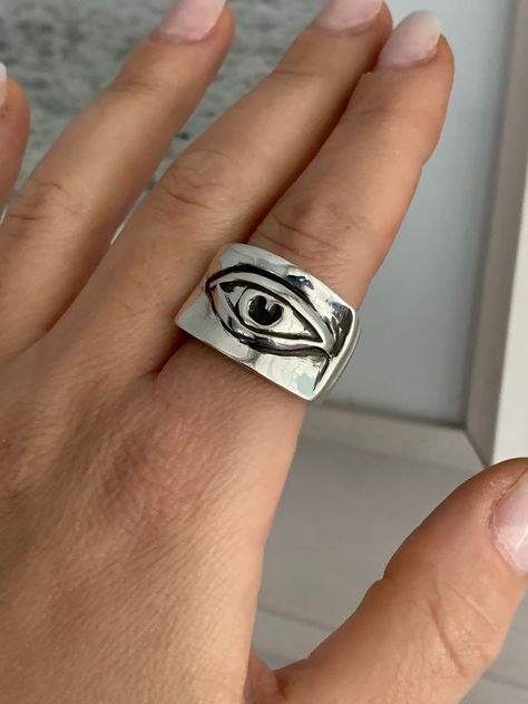 "Eye of Ra Ring, Wide Band Ring, Silver Statement Ring, Chunky Ring, Protection Ring, Silver Eye Ring, Heavy Silver Ring, Square Silver Ring ✔~ 100% Handmade ~ ✔~ 100% SOLID 925 Sterling Silver ~ ✔~ Height 4.5 MM ~ \"the upper part\" ~ ✔~ Width 17.0 MM ~ \"the upper part\" ~ ✔~ Weight 15.0 grams \"in medium size\" ~ ✔~ Μade to order ~ ✔~ Free shipping ~ ✔~ Available Express shipping ~ ✔~ Tracking number ~ ✔~ Elegant Gift box, Gift bag ~ ✔~ Available finish * POLISHED ~ MATTE ~ BRUSHED* ✔~ Ready Infinite Jewelry, Eye Ring Silver, Chunky Silver Rings, Protection Ring, Rough Jewelry, Unique Rings Vintage, Ring Square, Modernist Ring, Silver Eye