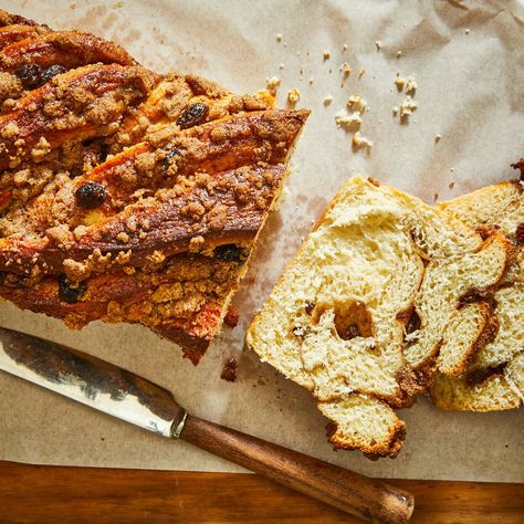 This sweet and swirly cinnamon-raisin babka is topped with a sprinkle of cinnamon-sugar streusel. Fresh orange juice and zest come through to give the flavor some added zing, which helps break up the sweetness and adds a nice bright flavor. This recipe makes two loaves--keep one for yourself and gift the other! You're sure to enjoy it in the morning alongside coffee or as a tasty afternoon treat. Babka Recipe, Easy Meatloaf, Cinnamon Raisin, Cinnamon Bread, Cinnamon Sugar, Dry Yeast, Raisin, Bread Recipes, Dough