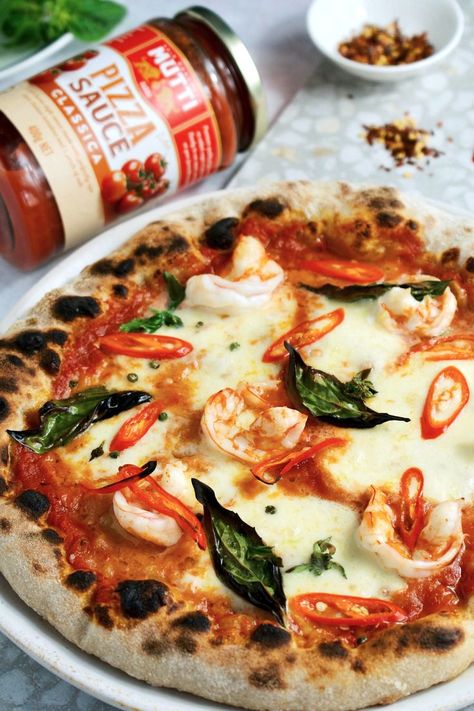 It's true in Italian cooking, seafood and cheese typically don't pair together, but sometimes it pays to break the rules – like with this Garlic Prawn and Chilli pizza made with Mutti Pizza Sauce. 

Pizzeria quality pizza sauce - made the Italian way from perfectly ripe tomatoes. Our new range of Mutti Pizza Sauces brings you a fresh and naturally sweet tomato flavour and a beautiful texture characteristic of crushed tomatoes in the artisanal style.⁣

Mutti. When you know, you know. Prawn Pizza, Garlic Prawn, Sticky Pork Ribs, Pizza Sauces, Shrimp Pizza, Prawn Dishes, Sticky Pork, Garlic Prawns, King Food