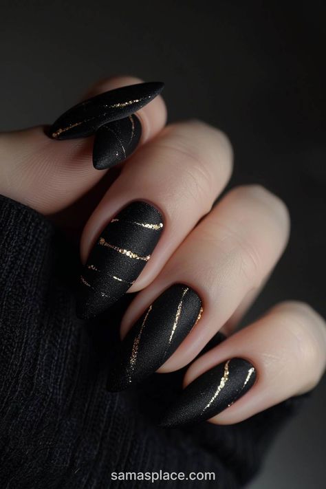 22 Blazing Black Winter Nails Art Ideas and Designs Black Gel Nails Almond Shape, Black And Gold Acrylic Nails Almond, New Years Nail Black, Dark Christmas Nails Almond, Gothic Short Nail Designs, Dark Winter Nails With Design, Black And Gold Winter Nails, Nail Art Designs Grunge, Black Nails With Chrome Design