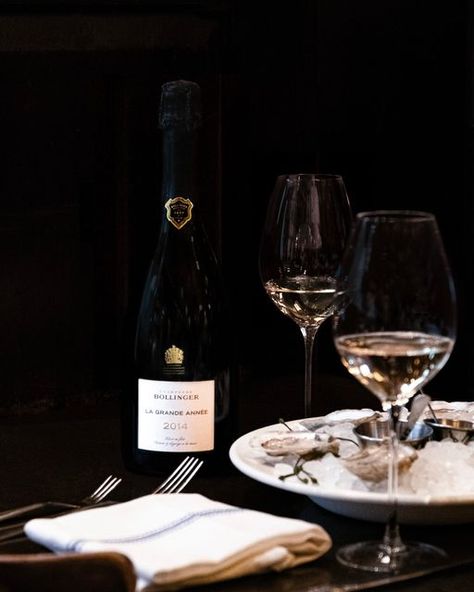 Champagne Bollinger on Instagram: "Admiring how the fine bubbles of La Grande Année 2014 catch the light as we await our dinner guest. #ChampagneBollinger #WeAreBolly #LaGrandeAnnee2014" Vodka Martini, Dinner Guest, Wine Cocktails, Mulled Wine, December 4, Wine Bar, White Wine, The Light, Martini