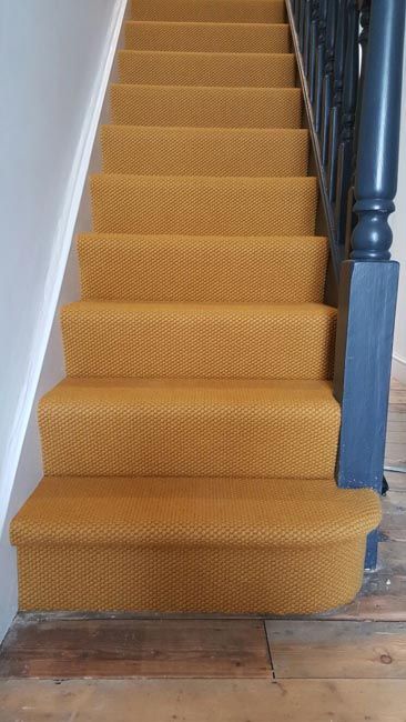 Orange Beige Stair Carpet Installation Bright Carpet Stairs, Yellow Carpet Stairs, Biscuit Colour Carpet Stairs, Stripy Stair Carpet And Landing, Yellow Stairs, Herringbone Stair Carpet Uk, Yellow Carpet, Carpet Staircase, Stair Banister