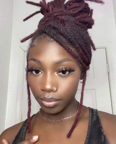 Cute hairstyles with locs on black woman l red loc inspo Burgundy Dreadlocks Black Women, Loc Work Styles, Burgundy Dreads Black Women, Burgandy Locs On Black Women, Dark Burgundy Locs, High Bun With Swoop, Fancy Loc Styles, Burgundy Locs Black Women, Dark Red Locs