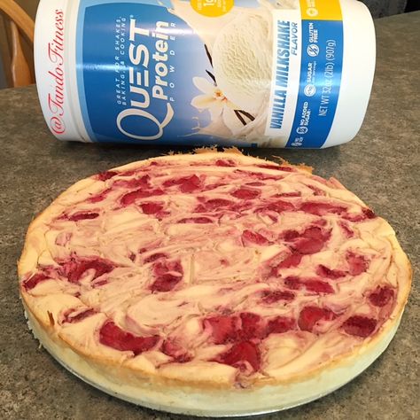 Creamy Cheesecake with Strawberry Swirls! Packing in 28g of protein per serving, this cheesecake will make your dreams come true! Protein Powder Cheesecake, Quest Protein Powder Recipes, Quest Protein Recipes, Quest Nutrition Recipes, Quest Recipes, Quest Protein, Protein Cheesecake, Protein Baking, Protein Cake