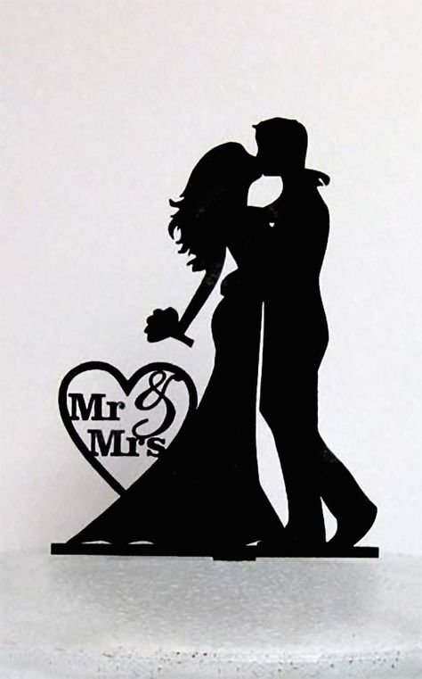 Silhouette wedding cake toppers are unique and can add a look of luxury to your wedding cake at minimal cost. This one comes in your choice of six colors, including metallics.  #WeddingCake #WeddingCakeToppers #ElegantCakeToppers #UniqueWeddingCake #UniqueCakeToppers #UniqueToppers Wedding Cards Images, 50th Wedding Anniversary Cakes, Silhouette Wedding Cake, 25th Wedding Anniversary Party, Wedding Anniversary Party Decorations, Wedding Cake Topper Silhouette, Silhouette Cake Topper, Silhouette Wedding, 50th Wedding Anniversary Party