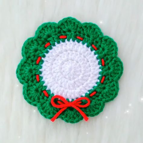 How to Crochet Christmas Wreath Coaster For Decor - The Newlywed Crochet Christmas Coaster Free Patterns, Crochet Ornament Coasters, Crochet Wreath Coaster Pattern, Christmas Crochet Coasters Patterns, Free Crochet Patterns For Christmas Coasters, Free Crochet Christmas Coasters, Crochet Xmas Coasters Free Pattern, Crochet Santa Coaster, How To Make A Doily