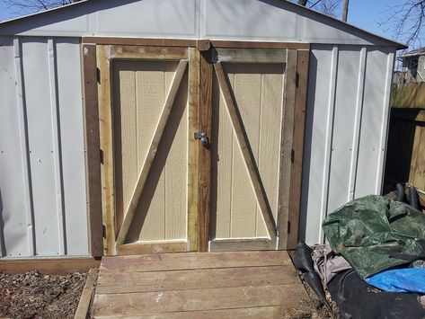 This large metal shed had rickety metal doors that were bent, falling off and useless. The home owner wanted to see if I could put wood doors on it to match another wood shed he had. He was going t… Metal Shed Door Ideas, Tin Shed Makeover, Shed Doors Diy, Shed Doors Designs, Metal Shed Ideas, Shed Door Ideas, Backyard Shed Ideas, Bookcase Redo, Shed Makeover