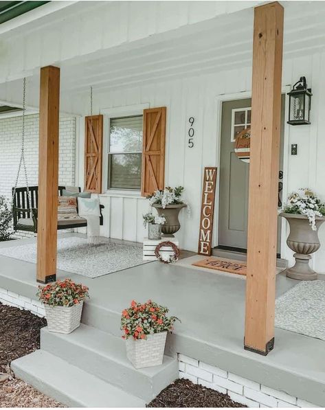 Full Length Porch, Barndominium Ideas Interiors One Story, Brick Ranch Farmhouse, White Siding Cedar Accents, White And Brown Farmhouse Exterior, Small Entry Deck Ideas, White House With Wood Trim, Concrete Covered Porch, White And Wood Farmhouse Exterior