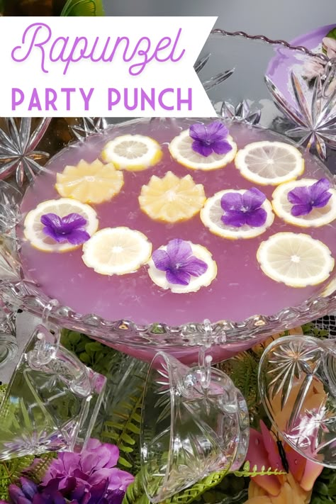 Purple Punch Recipe
Ingredients:
(1) 52 oz. bottle of Lemonade
(2) 52 oz. bottles of Limeade
1 cup of Ginger Syrup
4 oz. Butterfly Pea Flower Tea (or more to reach the desired purple color) Tangled Birthday Party Food Ideas, Rapunzel Drink Ideas, Princess Party Drinks, Repunzle Theme Birthday Party, Enchanted Party Food, Purple Lemonade Punch, Pink And Purple Tea Party, Tangled Drinks, Fairy Party Drinks