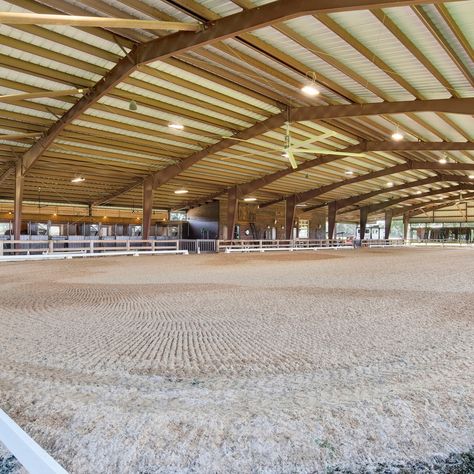 Discover your equestrian dream! 🐎☀️ Welcome to this one-of-a-kind 53-acre equestrian property just listed in the beautiful Fairhope, Alabama. Passing through the private, gated entrance, you’ll be greeted by manicured green pastures that set the stage for this equestrian haven. 🌿 80 x 210 covered riding arena GGT Fiber Blend Dressage Footing This arena features full-height mirrors along the west side and is equipped with industrial size ceiling fans, LED lighting, and a top-tier sound syst... Equestrian Property, Covered Riding Arena, Riding Arenas, Green Pasture, English Riding, Entrance Gates, Stables, Dressage, Equestrian