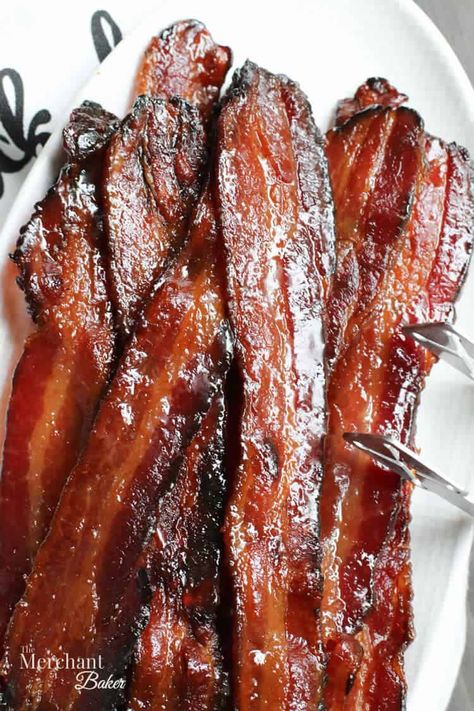 A close up image of Brown Sugar Maple Glazed Bacon from themerchantbaker.com Maple Candied Bacon Recipe, Maple Glazed Bacon, Maple Bacon Recipes, Candied Bacon Recipe, Pecan Balls, Brown Sugar Bacon, Bacon Recipe, Oatmeal Cups, Baked Bacon