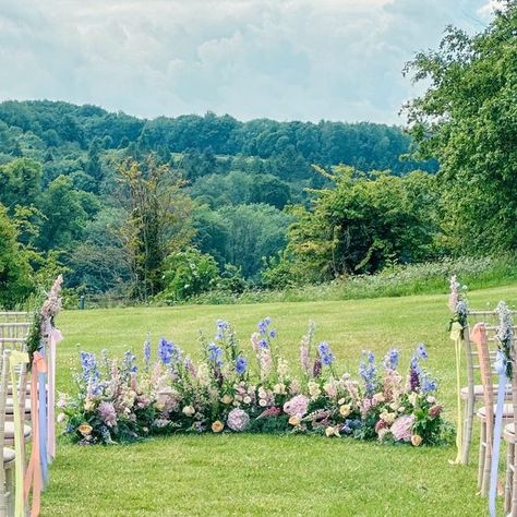 Hertfordshire / London Florist on Instagram: "The dreamiest outdoor ceremony set up full of pastel meadow inspired flowers  - - #floraldesigner #meadow #flowerpower #weddingstyling #unwedding #englishwedding #londonflorist #londonweddingflorals #londonwedding #wedluxe #floralstyling #meadowwedding #meadowweddingflowers #ceremony #ceremonydecor #romanticwedding #weddingseason #ceremonyflowers #floralstatement #floralinstallation #weddingflowers #outdoorceremony #weddingfoliage #outdoorwedding #weddinginstallation #outdoorweddingdecor #outdoorweddingideas #outdoorweddingvenue #chicwedding #meadowflower" Ceremony Meadow Arrangement, Meadow Arrangement, Ceremony Meadow, Wedding Meadow, English Wedding, Outdoor Wedding Decorations, Meadow Flowers, Ceremony Flowers, Outdoor Wedding Venues