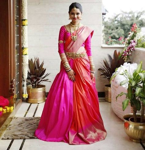 Gorgeous pink & orange lehenga saree for the wedding. See more on wedmegood.com #wedmegood #indianwedding #indianbride #lehenga #lehengacholi #bridallehenga #bridallehengacholi #lehengasaree #saree #southindianwedding #southindianbride #pink Cancan Saree Drape Bride, Cancan Saree, South Indian Bride Saree, Sari Lehenga, Lehenga Saree Design, Saree Wearing Styles, Half Saree Lehenga, Saree Draping Styles, Lehenga Style