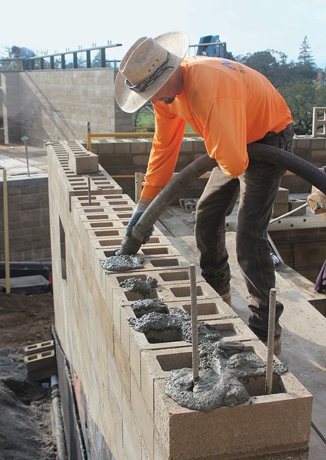 Edward De Reza of Watershed Materials uses a pump to fill blocks with concrete grout, which works with reinforcing steel to shore up the walls of the home. Concrete Block House, Yard Privacy, Rammed Earth Homes, Insulated Concrete Forms, Types Of Bricks, Front Yard Landscaping Pictures, Concrete Block Walls, Cinder Block Walls, Landscaping Florida