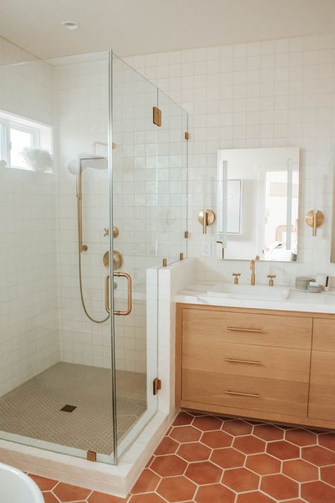 Renovated Master Bathrooms, Kohler Harken Vanity, Shower With Two Half Walls, Blush And Cream Bathroom, Shower Bath Combo Remodel, Brushed Gold Shower System, Kohler Vibrant Brushed Bronze, Red Stone Bathroom, Shower Next To Sink