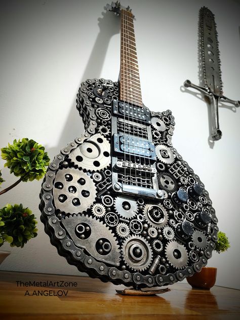 Fully functional electric guitar, Les Paul, handmade of scrap metal. Weight 8kg I will make it to order. Scrap Metal Guitar, Cool Guitar Designs, Custom Guitars Electric, Guitar Clock, Guitar Decor, Guitar Crafts, Music Room Design, Metal Sculptures Garden, Metal Guitar