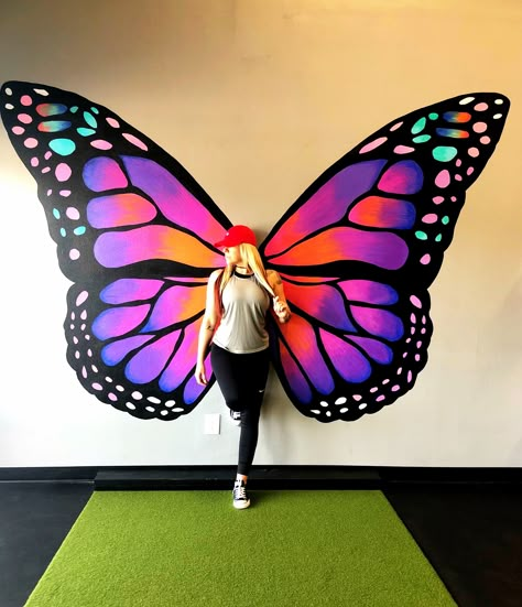 Butterfly Wings Wall Art, Selfie Zone Ideas, Butterfly Selfie Wall, Colorful Mural Ideas, Wings Painting On Wall, Wings Wall Painting, Wall Painting Butterfly, Diy Selfie Wall, Selfie Wall Design