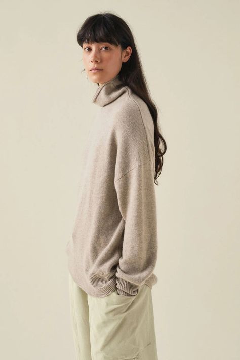 The Roll Neck Wool Cashmere Sweater in Oatmeal from TOAST. A loose roll neck brings an ease to our sweater, which is crafted from wool and recycled cashmere. Shaped to a relaxed silhouette with effortless dropped sleeves, then finished with rolled edges at the neck and cuffs. Wool and recycled cashmere blend. Sizing + Details → Made In China 90% Wool, 10% Cashmere Hand Wash Only Kelia Stands 5'8 And Wears S XS — Chest (PTP) 20“, Waist 19“, Length 26“ S — Chest (PTP) 21“, Waist 20“, Length 26.5“ Recycled Cashmere, Denver Co, Roll Neck, Soft Yarn, Made Goods, Cashmere Sweater, Jumpers And Cardigans, Cashmere Sweaters, Denver