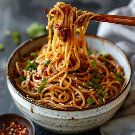 Chili oil noodles are a simple yet incredibly flavorful dish you can whip up in no time. Perfect for a quick lunch or dinner, these chewy noodles are coated in a spicy, aromatic chili oil that’s guaranteed to tantalize your taste buds. Serve them alone or with your protein of choice, and I guarantee you’ll quickly fall in love. . . . #bakedbyclaire #chilioilnoodles #chilioil #easydinner Noodles Photography, Chili Oil Noodles, Chilli Oil Noodles, Chili Oil Curry Noodles, Noodles Chili Oil, Spicy Chili Oil Noodles, Spicy Garlic Chili Oil Noodles, Cooking Photography, Chili Oil