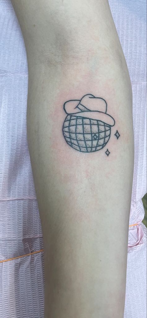 Disco ball cowboy hat tattoo Disco Cowboy Hat Tattoo, Cowboy Tattoo Simple, Dainty Cowboy Hat Tattoo, Disco Cowboy Tattoo, Disco Ball Cowboy Hat Tattoo, Disco Cowgirl Tattoo, Cowbell Tattoo, Disco Ball With Cowboy Hat Tattoo, Cowboyhatt Tattoo