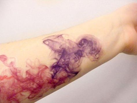 Colored smoke tattoo on the forearm | www.otziapp.com Catrine Demew, Watercolour Tattoos, Tattoo Trend, Disney Tattoo, Geniale Tattoos, Tatuaje A Color, Space Tattoo, Color Abstract, Diy Tattoo