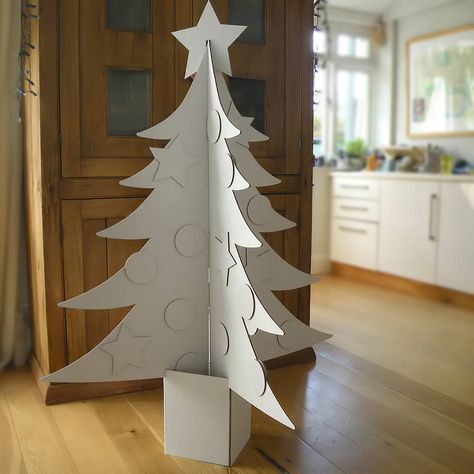 Giant Cardboard Christmas Tree  by Letterfest  $68.54 #christmas #tree Decoracion Navidad Diy, Cardboard Tree, Cardboard Christmas Tree, Cardboard Christmas, Decoration Vitrine, 3d Christmas Tree, Alternative Christmas, Alternative Christmas Tree, Black Christmas Trees