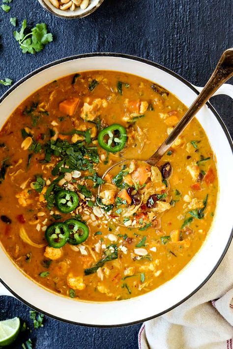 African Peanut Stew + Video (prep ahead and vegan options) African Peanut Soup With Chicken, African Peanut Stew Chicken, African Chicken Peanut Stew, African Soups And Stews, Peanut Stew African, African Stew Recipes, Ground Nut Stew, Thai Peanut Soup, West African Peanut Stew