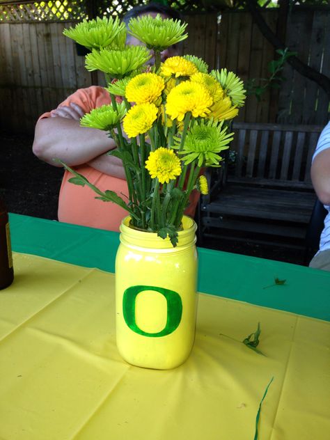 University of Oregon graduation party University Of Oregon Graduation Party, Oregon Ducks Party, Baylor Graduation, Graduation Party University, Duck Wedding, Graduation Centerpieces, Duck Party, Gold Graduation Party, Graduation Party Centerpieces