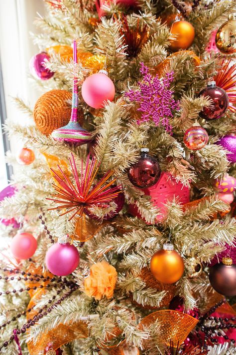 House Tour: A Home with 100 Colorful Christmas Trees | Apartment Therapy Orange Christmas Tree, Retro Christmas Decorations, Bohemian Christmas, Orange Christmas, Tropical Christmas, Pink Christmas Decorations, Christmas Tree Inspiration, Pink Christmas Tree, Colorful Christmas