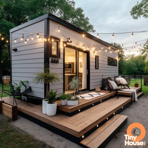 Looking for decoration inspo? Check out this contemporary and cozy tiny house with a white and natural wood patio! The grey accents add a touch of sophistication. Perfect for maximizing space! #TinyHouse #DecorationInspo #CozyHome Modern Tiny House Exterior Ideas, Annexe Ideas Layout, Adu Homes, Hanna House, Cozy Tiny House, Land Purchase, Tiny House Cottage, Tiny House Exterior, Backyard Studio