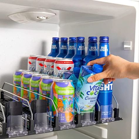 This adjustable can organizer is amazing for tidying up your fridge.  It can widen to fit multiple different can sizes. Easy to assemble without any screws or tools! Prevents the need to reach into the back of the fridge. #organization#affiliate Refrigerator Bottle Organizer, Drink Refrigerator Organization, Drink Organization Fridge, Beverage Fridge Organization, Drink Fridge Organization, Soda Organizer, Drink Organizer, Drink Fridge, Water Bottle Organization