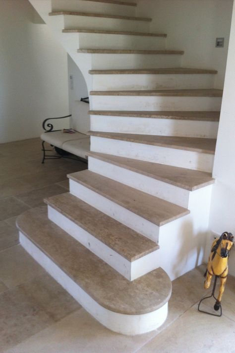 We manufacture and deliver all over France staircases in our natural stone from Burgundy. There are several ways to manufacture a staircase in Burgundy limestone.  > Fixing on a concrete support (treads + risers), The classic method for renovation or new houses A good tiler or mason is competent to carry out this type of layout.  > Spiral stairs (treads + risers) Gives our staircases an incomparable elegance and slenderness compared to the layout on concrete. Solid Staircase, Natural Stone Stairs, Travertine Stairs, Stairs Treads, Staircase Spiral, Stairs Treads And Risers, Italian Style Home, Stone Staircase, Flooring For Stairs