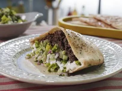 Greek Pita Sandwiches Recipe | Geoffrey Zakarian | Food Network Greek Pita Sandwiches Food Network, Geoffrey Zakarian Greek Pita Sandwich, Greek Pita Sandwich, Pita Sandwich Recipes, Campfire Bread, Greek Sandwich, Chocolate Chantilly, Pita Sandwich, Greek Pita