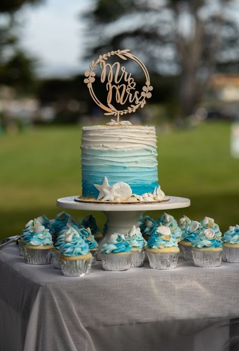 Small Wedding Cakes Beach Theme, Beach Wedding Cake And Cupcakes, Small Beach Wedding Cake, Beach Themed Cake Ideas, Ocean Theme Wedding Ideas, Beach Themed Wedding Cakes, Small Beach Wedding Ideas Simple, Wedding Cake Beach, Beach Wedding Cake Ideas