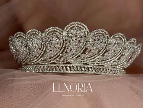 Queeny Bridal Tiara Crown | Unique Silver Wedding Headpiece with Clear CZ Crystals Looking for a unique bridal tiara design? Take a close look at this bridal headpiece, then close your eyes and picture it with your beautiful white dress. Looks stunning. With its amazing design, it will add to your bridal glow. This one goes with a veil as well which makes it the best choice for all scenarios.  Materials & Color: Cubic Zirconia, Silver-plated Measurement: approximately 6 cm wide.  FREE SHIPPING W Unique Bridal Veils And Headpieces, Wedding Tiaras And Crowns, Silver Wedding Headpiece, Glittery Jewelry, Tiara Design, Bridal Veils And Headpieces, Black Tiara, Swarovski Tiara, Beautiful White Dress