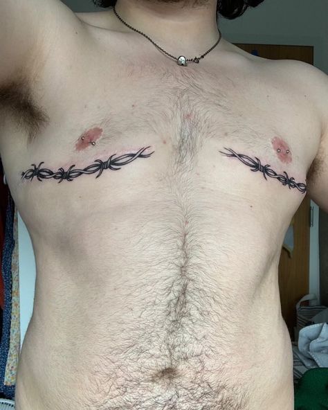 Trans Scar Tattoos on Instagram: “Here is @whack.k with sick piercings and ink over the scars! 🖤 Submit your own trans surgery scar tattoo cover ups/incorporation by DM to…��” Trans Men Tattoo Ideas, Trans Men Chest Tattoos, Trans Guy Tattoo, Top Sergury Scar Tattoos, Top Surgery Scar Tatoos, Tattoo Ideas Top Surgery, Pelvis Tattoos Men, Top Surgery Ftm Plus Size, Tattoo Ideas Gender Neutral