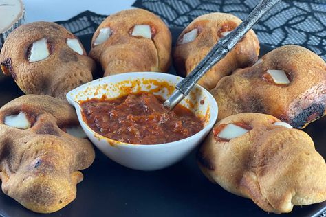 These individual skull calzones are the perfect, gory, macabre, Halloween dinner idea that you need to feed your family and ensure the kids will eat! This recipe is easy - refrigerated pizza crust dough, mini pepperonis, shredded cheese, ricotta cheese, and sauce make these spooky treats even better than the plain personal calzones you get from your local pizza place. The post Skull Calzones appeared ... Skull Calzones, Blue Cheese Appetizers, Macabre Halloween, Tuna Melt Sandwich, Meat Candy, Baked Appetizers, Pizza Crust Dough, Local Pizza, Tuna Melts