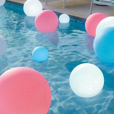 Pool Decor and Accessories: Best Places to Shop | Hunker Pool Mat, Walkway Lights, Floating Lights, Wedding Vow, Pool Decor, Pool Light, Flickering Candles, Pool Side, Playlist Covers