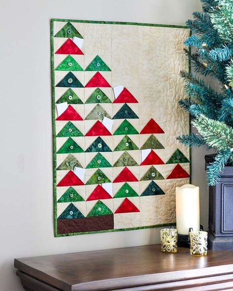 @quiltsocial posted to Instagram: From A Needle Pulling Thread ✨⁣ ⁣ Oh, Christmas Tree Advent Calendar 🎄⁣ ⁣ This is one of the most charming advent calendar quilt patterns you’ll find! Made primarily out of flying geese and in the shape of half a Christmas tree. Link in Bio!! 💙⁣ ⁣ #QUILTsocial #quilting #modernquilt #quilts #quiltersofinstagram #lovetoquilt #easyquiltingprojects #easyquiltingtutorial #quiltingtutorial #freequiltingpatterns #freequiltingmagazine Calendar Quilts, Easy Quilt Tutorials, Christmas Tree Advent Calendar, Spring Banner, Modern Table Runners, Heart Quilt, Christmas Quilt, Christmas Quilts, Christmas Advent