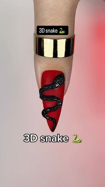 Nail art 💅 Manicure on Instagram: "Creator @anastasiia.nails.nl - Long red nails with a matte finish♥️, topped with an impressive 3D black snake.🐍 The snake is created using a top coat, covered with special foam, and then cured.🧼
This technique gives the nails a unique texture, resembling snake skin.🐍
A perfect choice for those who love bold and unusual manicures with attention to detail.🥰

Would you get nails like these?👇🏼✍️

#3Dsnakenails #halloweennails #redsnnakenails #3Dnailart #snakenaildesign #halloweennailart #spookynails #3Dhalloweennails #rednails #snakehalloweenmanicure #nailartinspo #nailsofinstagram #snakeinspirednails #eleganthalloweennails #red3Dnails #nailartdaily #fallnails #spookynailart #nailartideas #luxurynails #snakehalloweennailart #nailfashion #halloweenmanic Snake Art Nails, Nail Art Snake Design, Snake Skin Nails Designs, Snake Nails Designs, Snake Skin Nails, Long Red Nails, Halloween Manicure, Witchy Nails, Instagram Creator